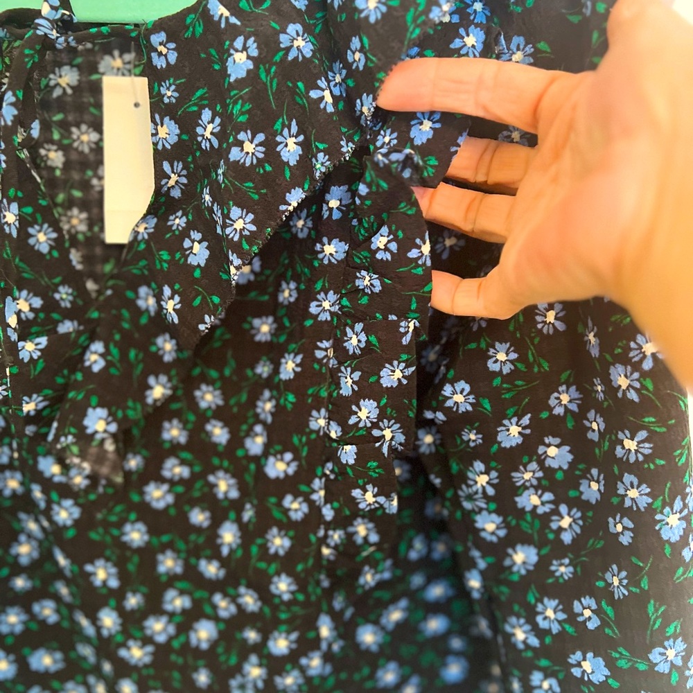 Pretty blouse, black/blue floral. Puffy sleeves, ruffled